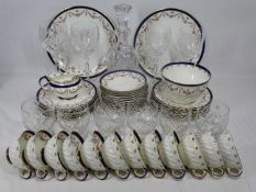 GEORGE JONES 'CRESCENT' PART TEASET, forty pieces and a glass decanter with stopper with ten similar