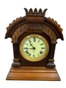 ANSONIA CLOCK COMPANY NEW YORK OAK CASED MANTEL CLOCK - the cream enamel dial set with Roman