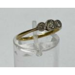 18CT GOLD THREE STONE DIAMOND RING - size M, 2grms, 0.40 combined visual estimate