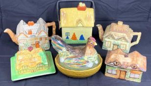 COTTAGEWARE TEAPOTS, butter dishes, ETC and a Staffordshire 'hen on nest', 6 items in total
