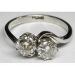 PLATINUM TWO STONE CROSSOVER DIAMOND RING - the stones 0.50ct each, colour near white, some small