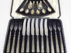 CASED SILVER FLATWARE, two sets and a pair of Continental pepper pots in the form of acorns, stamped