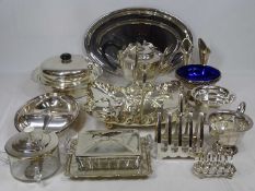 POLISHED EPNS WARE, a mixed quantity to include a swing handled breadbasket, muffin dish and