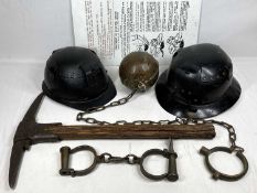 VINTAGE MINER'S HELMETS (2), pickaxe, heavy weight ball and chain and a pair of iron handcuffs