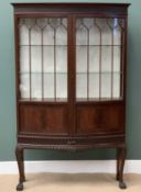 QUALITY BOW FRONT DISPLAY CABINET - antique mahogany with twin glazed doors, carved plinth and apron