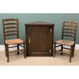 ANTIQUE OAK SINGLE DOOR HANGING CORNER CUPBOARD, 90cms H, 77cms W, 41cms D and two rush seated,