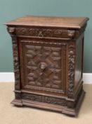 HEAVILY CARVED CONTINENTAL NARROW SIDEBOARD with single drawer and door having lion's head carvings,