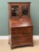 GEORGIAN MAHOGANY CAMPAIGN STYLE BUREAU with upper twin mirrored doors and carry handles, 156cms
