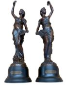 SPELTER FIGURINES ON PLINTHS, a pair - titled 'Le Printemps' and 'L'automne', 43cms tall