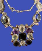 A 925 SILVER NECK CHAIN - with six large oval decorative stones to the chain and nine stones of