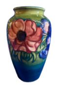 MOORCROFT ANENOME VASE - on a tonal green ground, impressed marks and signature along with