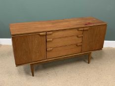 MID-CENTURY TEAK TYPE SIDEBOARD BY 'AUSTIN SUITE' - three central drawers flanked by cupboard doors,