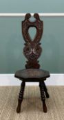 CARVED OAK SPINNING CHAIR, probably Welsh, shaped back with heart ornament above hexagonal seat,