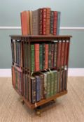 MAHOGANY & EBONY STRUNG REVOLVING BOOKCASE, tooled green leather inset top, and containing