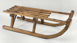 VINTAGE ASH 'DAVOS' TOBOGGAN, slatted seat stamped 'Davos', 85cms long