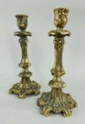 PAIR MID-VICTORIAN GOTHIC REVIVAL BRASS CANDLESTICKS, heavily cast with scrolls and weighted