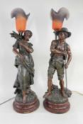 PAIR FRENCH PATINATED SPELTER FIGURAL TABLE LAMPS, 'Moissonneur' & 'Moissonneuse' titled bases, with