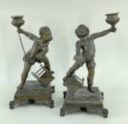 PAIR FRENCH PATINATED SPELTER FIGURAL CANDLESTICKS, of child acrobats, boy and girl in circus