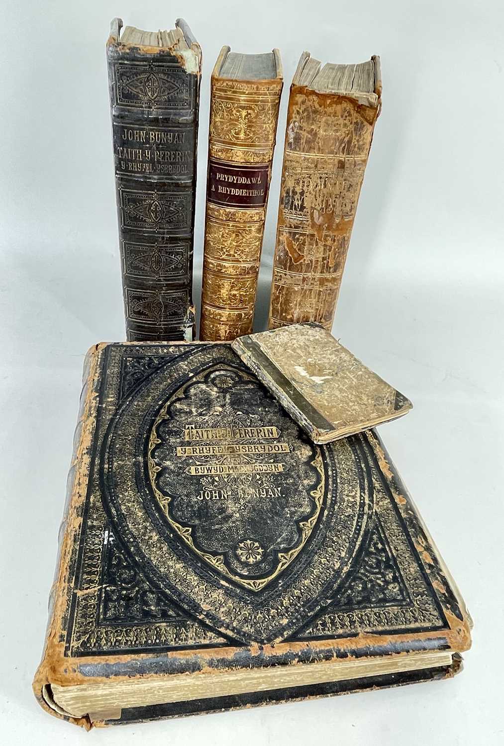 ANTIQUARIAN BOOKS (5) comprising (1&2) two Welsh language editions of John Bunyan's 'Pilgrim's