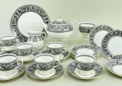 WEDGWOOD 'FLORENTINE' PATTERN TEA SERVICE, comprising seven tea cups, eight saucers, six side