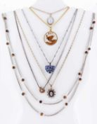 SIX VARIOUS CHAINS WITH PENDANTS, including 1940 farthing and tigers eye bead chain (6)