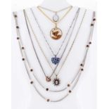 SIX VARIOUS CHAINS WITH PENDANTS, including 1940 farthing and tigers eye bead chain (6)