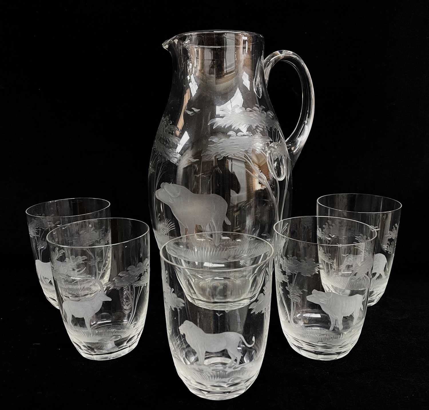 A ROWLAND WARD ENGRAVED CLEAR GLASS WATER SET, comprising baluster jug and five beakers all engraved