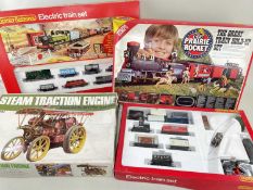 FOUR BOXED TOY SETS, including Hornby R541 GWR electric Freight Set, another similar lacking