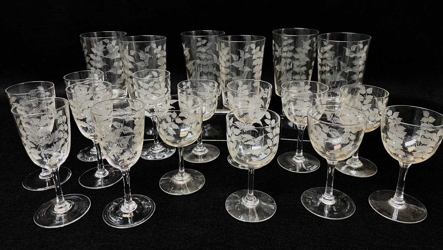 SUITE OF FOLIATE ENGRAVED GLASSWARE, comprising 8 sherry glasses, 6 port glasses and 6 water beakers