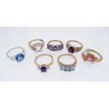 SEVEN MODERN 9K GOLD DRESS RINGS, set with various semi-precious gem stones, some stamped 'QVC',