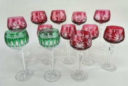 THREE SUITES OF BOHEMIAN HOCK GLASSES comprising pair of green flashed glass, pair red flashed