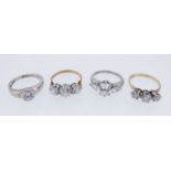 FOUR 9K GOLD CUBIC ZIRCONIA DRESS RINGS, 15.2gms gross (4) Provenance: private collection Gwynedd,