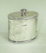 GEORGE V SILVER TEA CADDY, Goldsmiths & Silversmiths Co., London 1911, oval with engraved