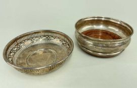 SILVER PIERCED CIRCULAR BON BON DISH together with silver and turned wooden bottle coaster,