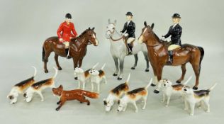 BESWICK FOX HUNTING GROUP, comprising two huntswomen on grey and bay horses model no. 1730, huntsman