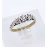 18CT GOLD & PLATINUM THREE STONE DIAMOND ILLUSION SET RING, ring size L, 2.1gms, in J. J. Lewis of