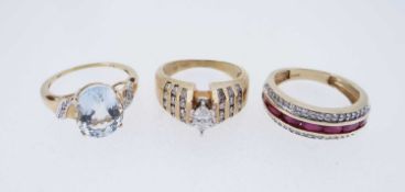 THREE MODERN 14K GOLD DRESS RINGS, comprising diamond and ruby triple row ring, diamond ring, and