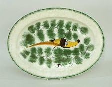 LATE 18TH/EARLY 19TH CENTURY PEARLWARE MEAT PLATTER, naively painted with a peacock or pheasant in a