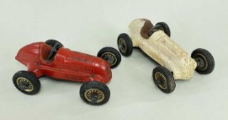 TWO SCHUCO STUDIO TIN PLATE RACING CARS, white no.7 and red no.6, F (2)