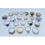 TWENTY ONE SILVER MODERN DRESS RINGS, set with varied semi-precious gem stones including '