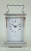 MODERN SWISS CARRIAGE CLOCK, retailed by Tiffany & Co., ser. no. 21***1, quartz movement, 14.5cm h