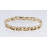 YELLOW METAL 'ATASAY' LADIES BRACELET, of key design, 20cms long, stamped '585', 14.5gms Provenance: