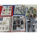 LARGE COLLECTION OF TRADING CARDS, in albums numbered 18-23, and including Laurel & Hardy,