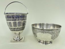 TWO SILVER ITEMS comprising late Victorian silver pierced sugar-basket, having swing handle raised