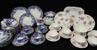 TWO CHINA TEA SETS, comprising blue and white floral printed set for 12 (2 cups missing); and