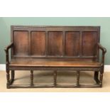 ANTIQUE OAK SETTLE/OPEN BENCH with five fielded panel back and carved detail top and front, the open