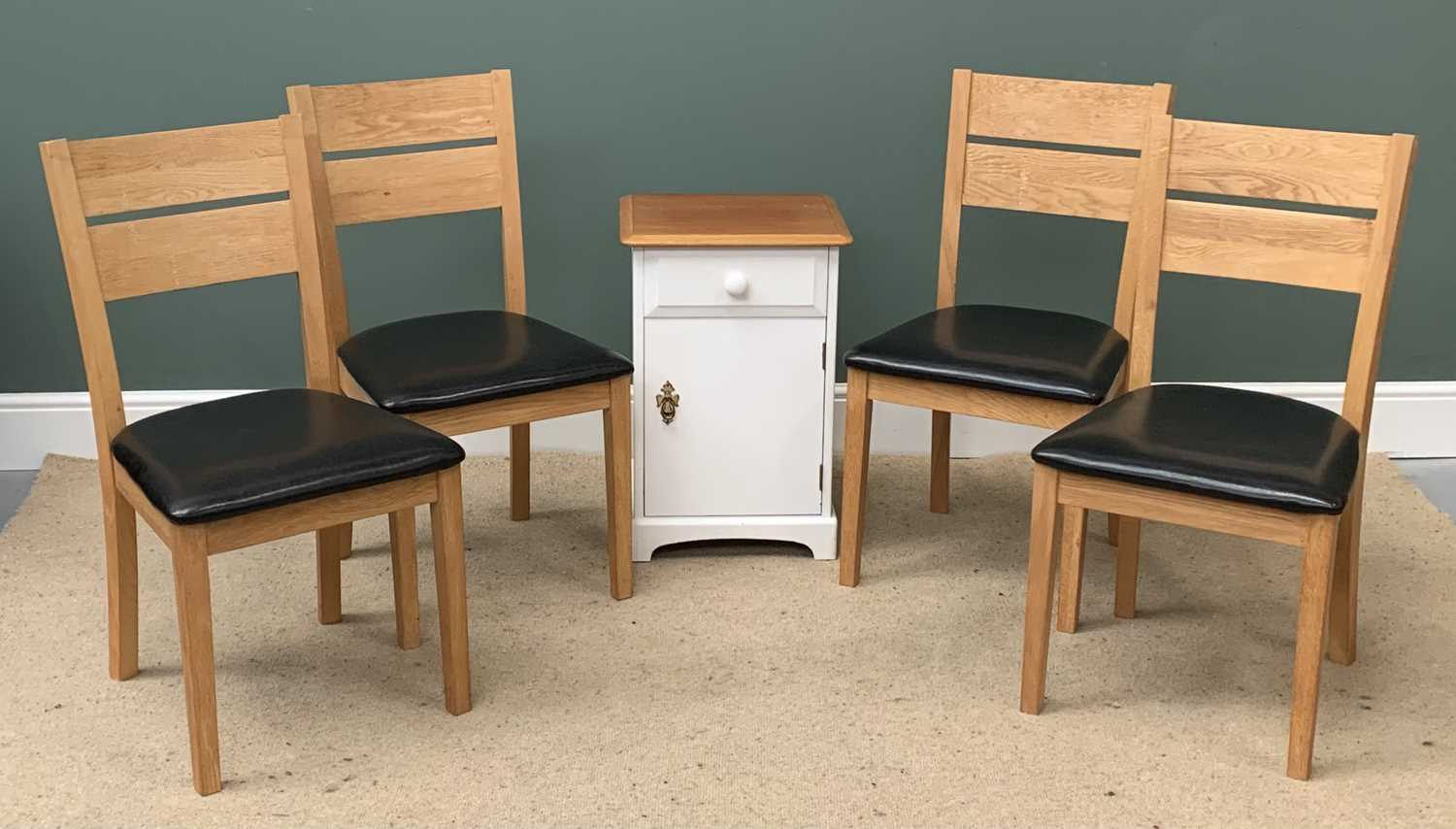 FOUR MODERN DINING CHAIRS with vinyl seats and a white painted bedside cabinet, 65cms H, 43cms W,