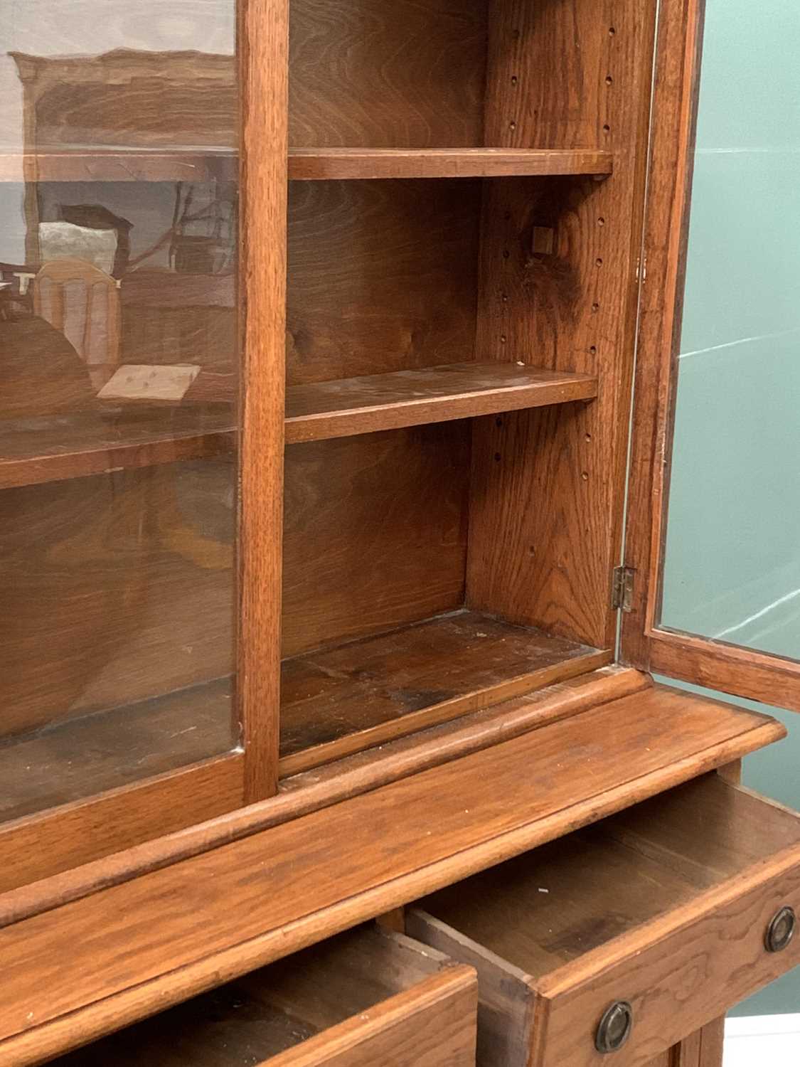 MID CENTURY OAK BOOKCASE CUPBOARD, the twin glazed door top with interior adjustable shelves and the - Image 3 of 4