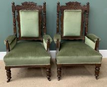 PAIR OF ANTIQUE EASY CHAIRS - Edwardian carved oak in green upholstery, 109cms H, 68cms W, 63cms D