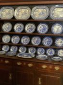 DRESSER PLATES & PLATTERS - Willow and other blue and white, approximately forty five pieces